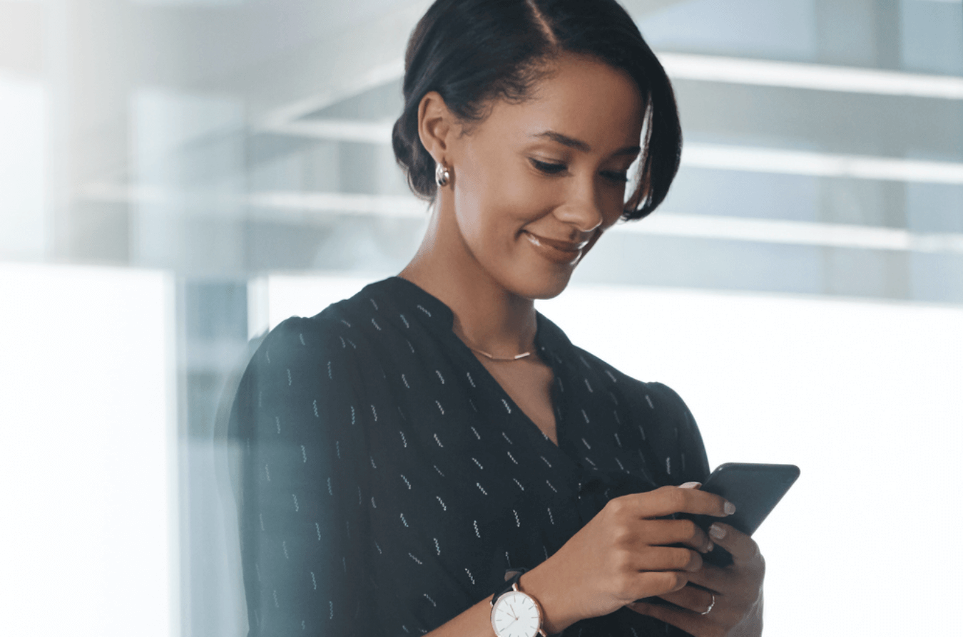 5G Woman looking at smartphone