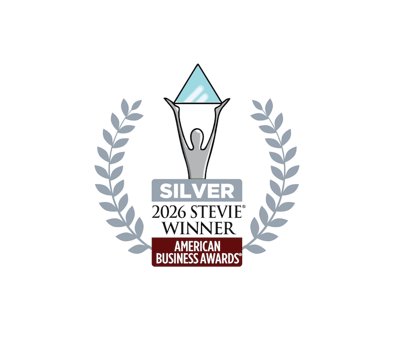 Silver 2026 Stevie Winner emblem from the American Business Awards, featuring a raised figure holding a blue gem and laurel branches on either side.