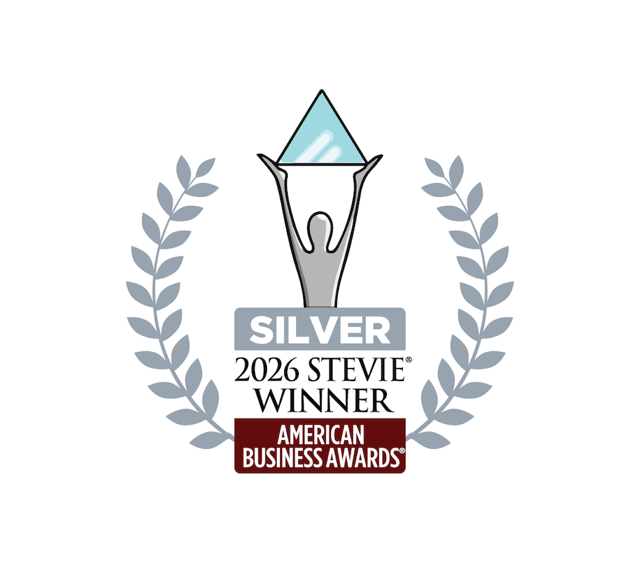 Silver Stevie Award badge for 2026 American Business Awards with laurel wreaths and a figure holding a crystal triangle.