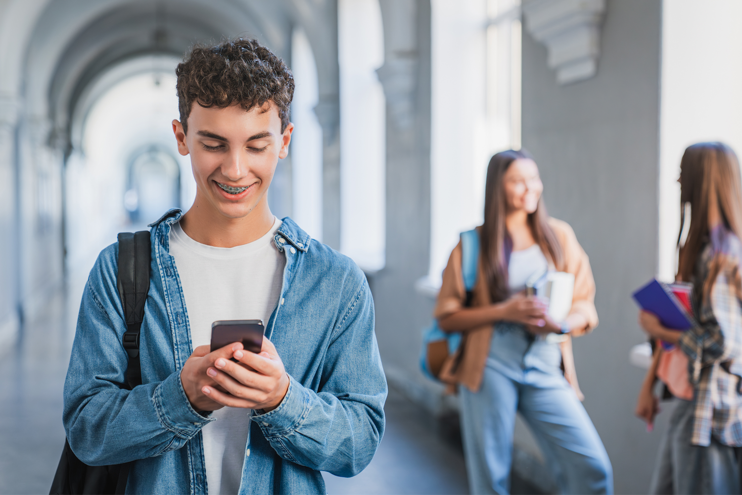 back to school, kid on cell phone