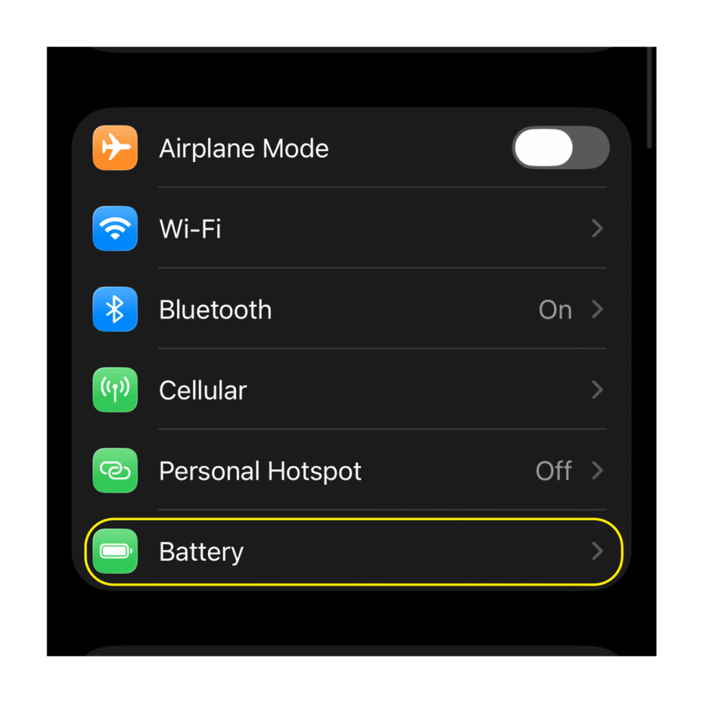 Battery settings option highlighted in the iPhone Settings list with a green battery icon on the left